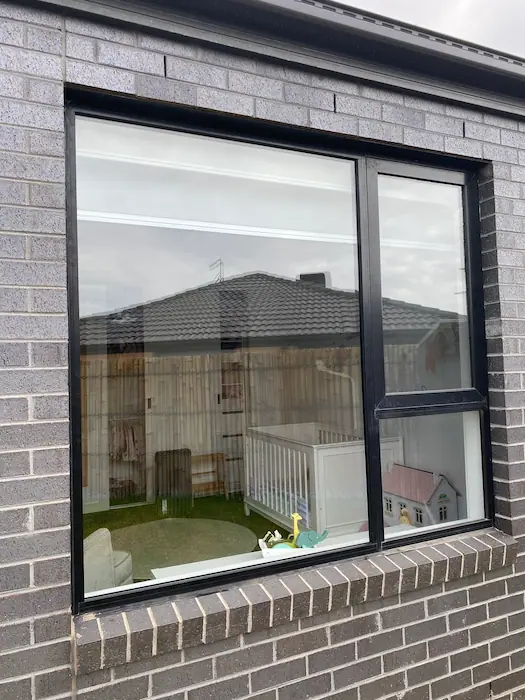 Alt text: QuickSafe glazier installing AS1288 safety glass in a Point Cook home
